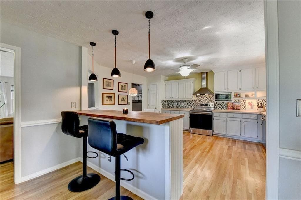 4 bedroom, 3 bathroom, 2,438 sq ft single family residence for sale at 6224 Ivy Springs Drive, Flowery Branch, GA 30542 — photo 3