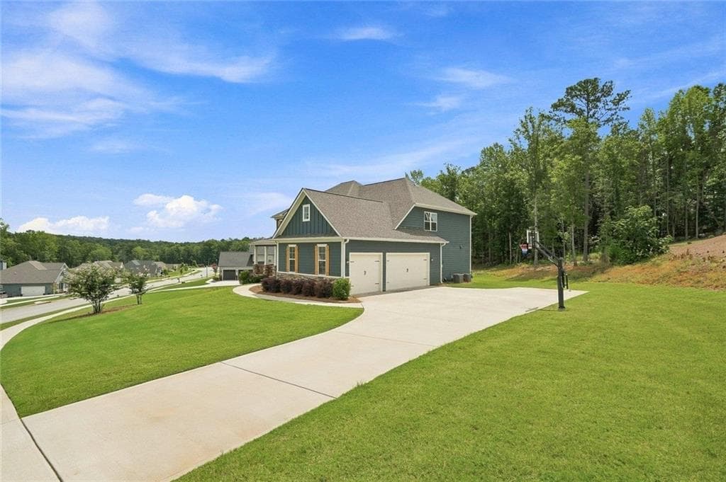 5 bedroom, 4 bathroom, 3,368 sq ft single family residence for sale at 115 Lapis Lake Point, Fayetteville, GA 30215 — photo 2