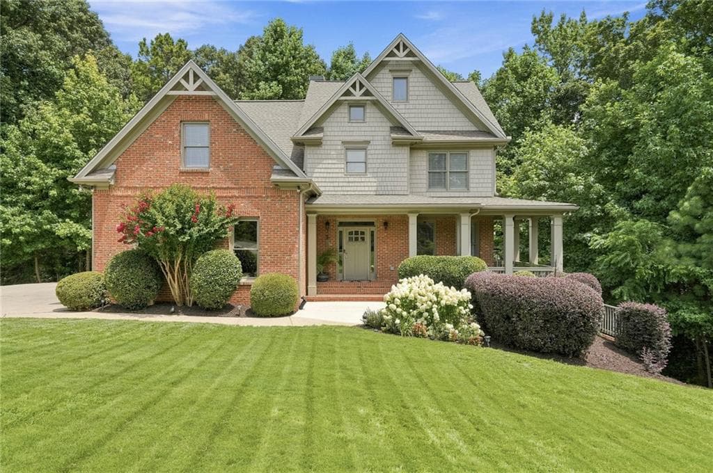 6 bedroom, 5 bathroom, 4,600 sq ft single family residence for sale at 7535 Antique Barn Avenue, Cumming, GA 30041 — photo 1 of 40