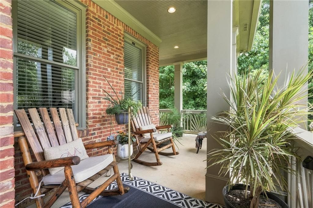 6 bedroom, 5 bathroom, 4,600 sq ft single family residence for sale at 7535 Antique Barn Avenue, Cumming, GA 30041 — photo 2