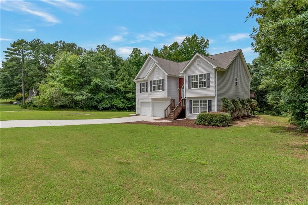 4 bedroom, 3 bathroom, 2,519 sq ft single family residence for sale at 1388 Sierra Ridge Place, Loganville, GA 30052 — photo 2