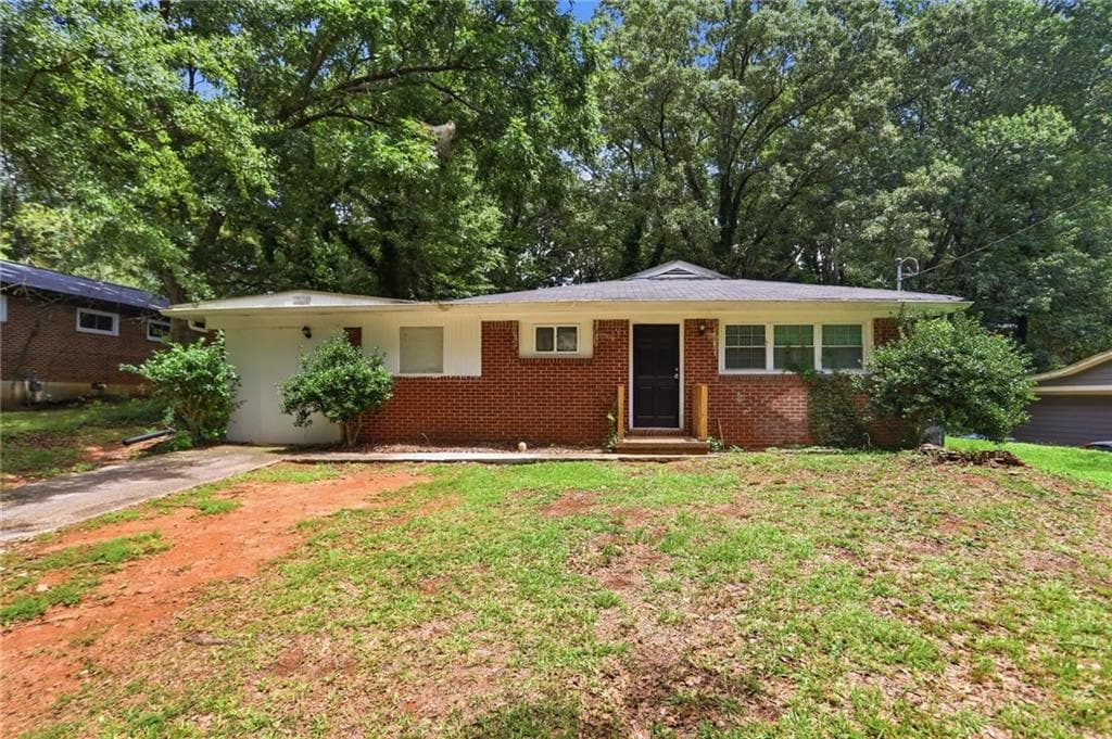 3 bedroom, 1 bathroom, 1,352 sq ft single family residence for sale at 1836 Evans Drive, Atlanta, GA 30310 — photo 1 of 25
