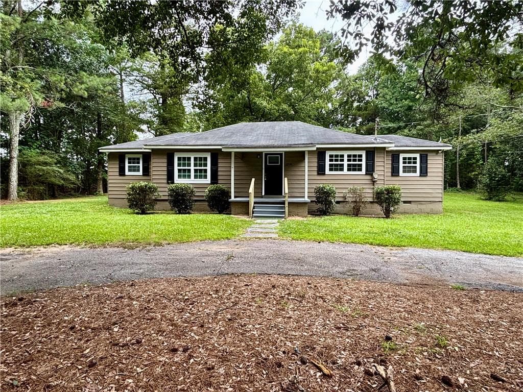 3 bedroom, 2 bathroom, 1,200 sq ft single family residence for rent at 1791 Harbins Road, Dacula, GA 30019 for $1,750 a month — photo 1 of 21