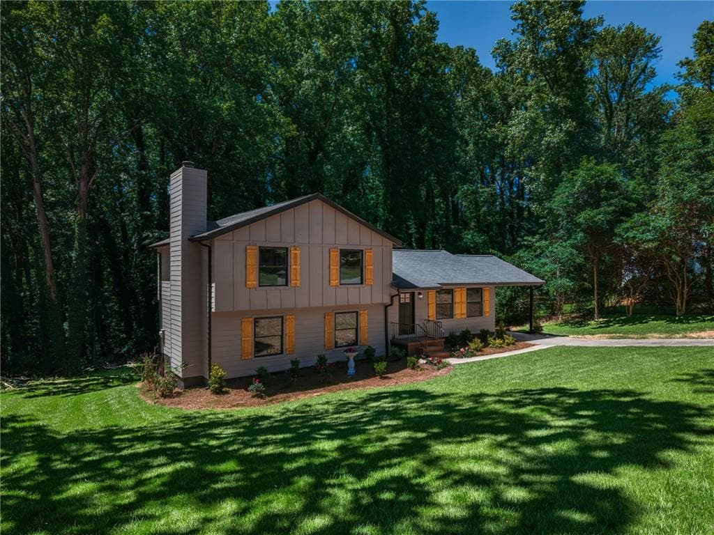 4 bedroom, 3 bathroom, 1,956 sq ft single family residence sold at 712 Overland Trail, Woodstock, GA 30189