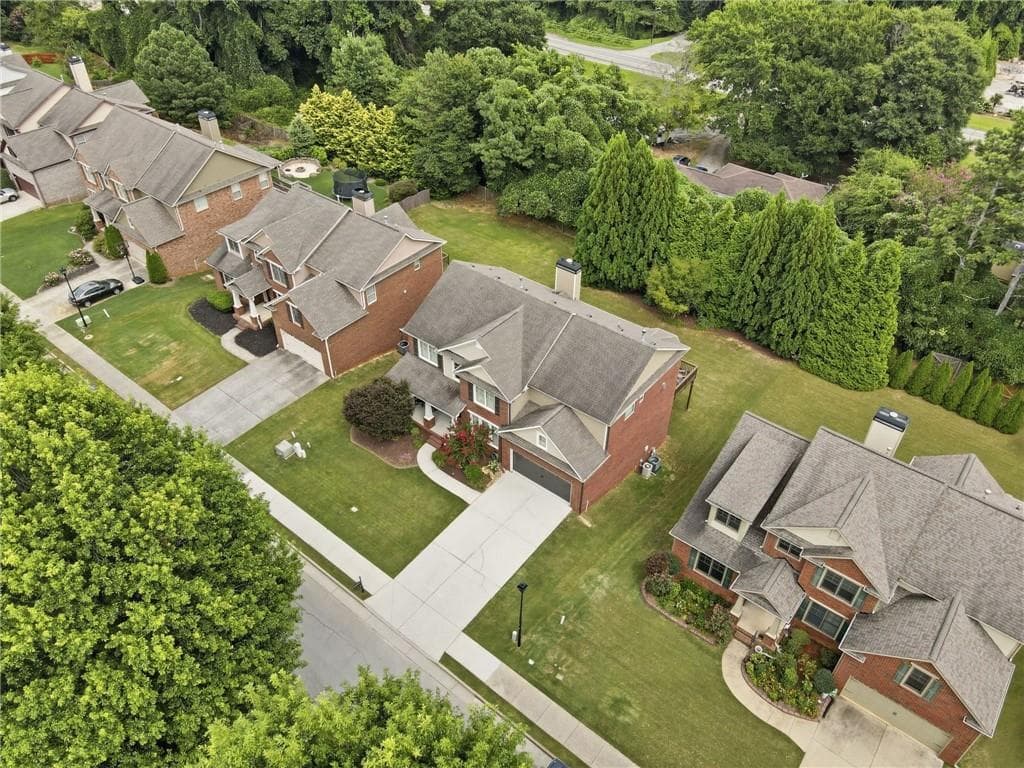 5 bedroom, 3 bathroom, 3,492 sq ft single family residence for sale at 6107 Stillwater Place, Flowery Branch, GA 30542 — photo 3