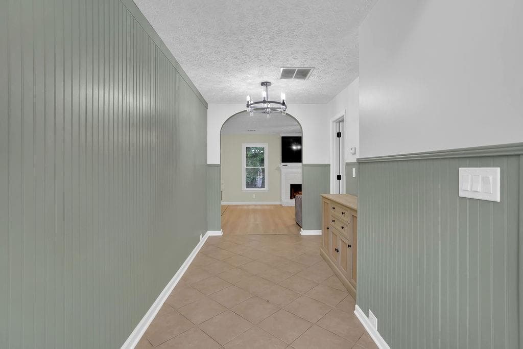 4 bedroom, 3 bathroom, 2,394 sq ft single family residence for sale at 8011 Huntcliff Road, Woodstock, GA 30189 — photo 3