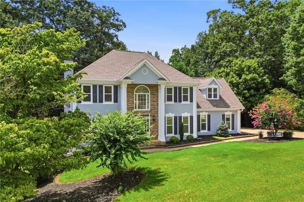 6 bedroom, 4 bathroom, 3,740 sq ft single family residence for sale at 1039 Avery Creek Drive, Woodstock, GA 30188 — photo 3