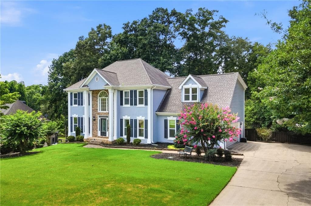 6 bedroom, 4 bathroom, 3,740 sq ft single family residence for sale at 1039 Avery Creek Drive, Woodstock, GA 30188 — photo 4