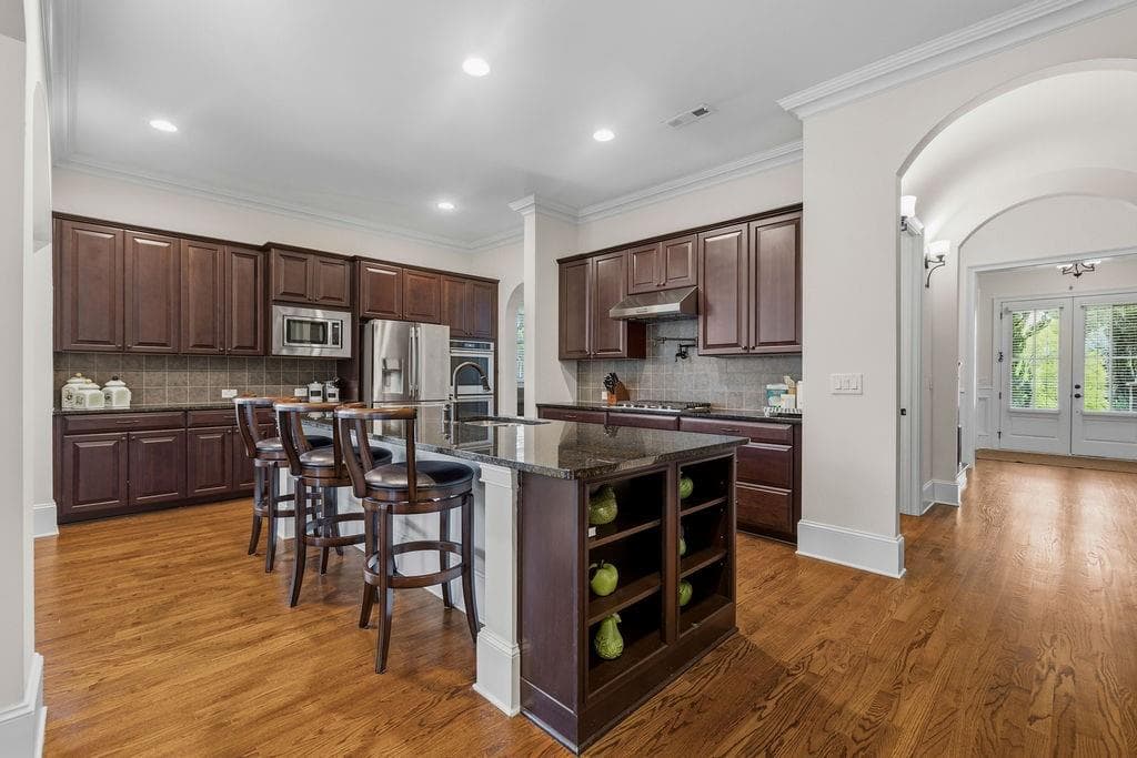 6 bedroom, 6 bathroom, 5,301 sq ft single family residence for sale at 4786 Olde Village Cove, Dunwoody, GA 30338 — photo 6