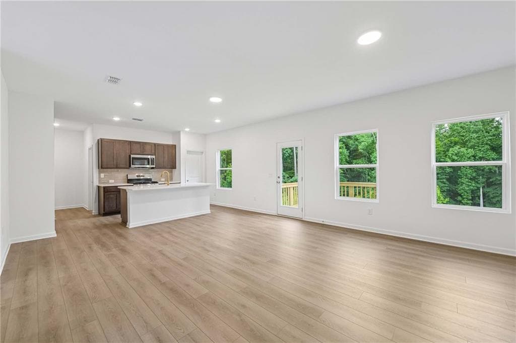 4 bedroom, 3 bathroom, 2,091 sq ft single family residence for sale at 5364 Heron Bay Boulevard, Locust Grove, GA 30248 — photo 5