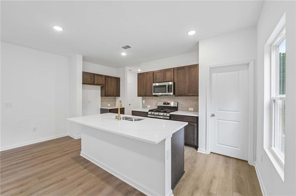 4 bedroom, 3 bathroom, 2,091 sq ft single family residence for sale at 5364 Heron Bay Boulevard, Locust Grove, GA 30248 — photo 6