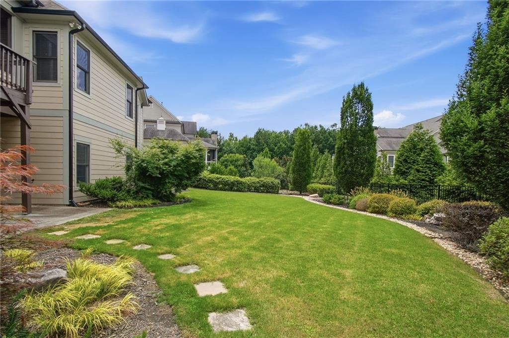6 bedroom, 6 bathroom, 5,301 sq ft single family residence for sale at 4786 Olde Village Cove, Dunwoody, GA 30338 — photo 2