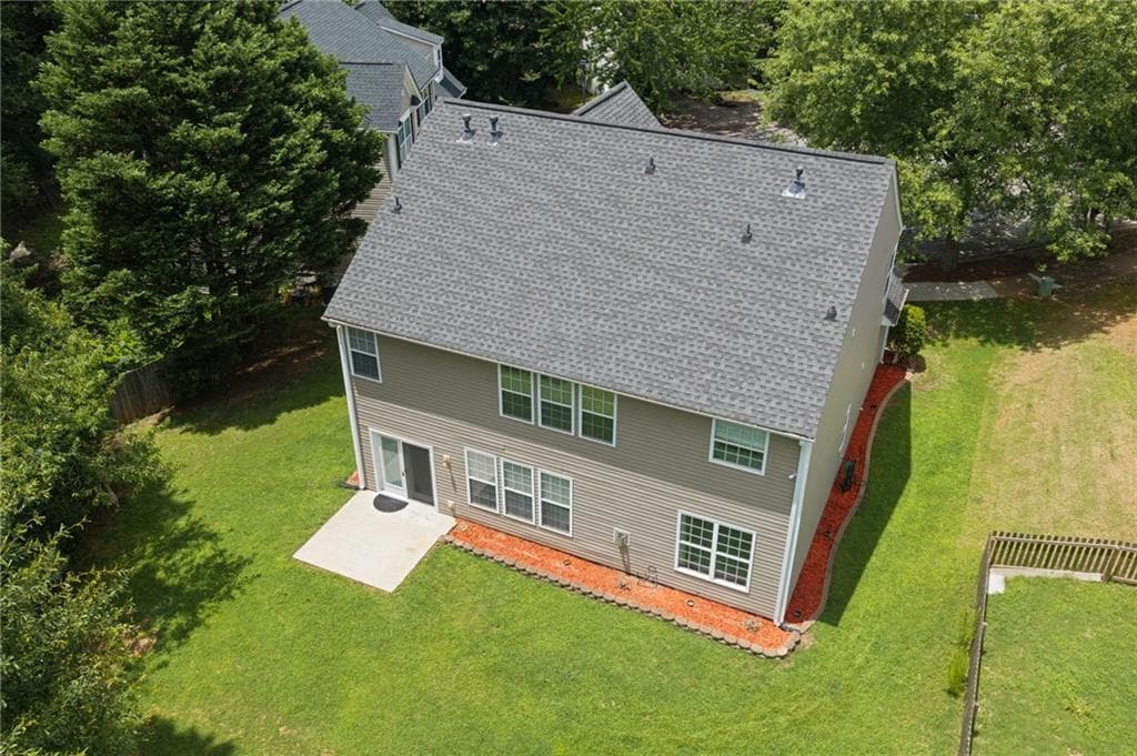 5 bedroom, 3 bathroom, 2,568 sq ft single family residence for sale at 951 Island Pointe Way, Buford, GA 30518 — photo 2