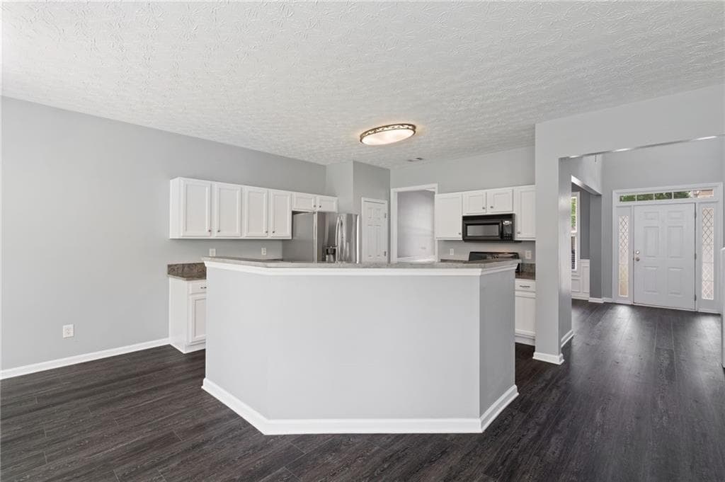 5 bedroom, 3 bathroom, 2,568 sq ft single family residence for sale at 951 Island Pointe Way, Buford, GA 30518 — photo 10