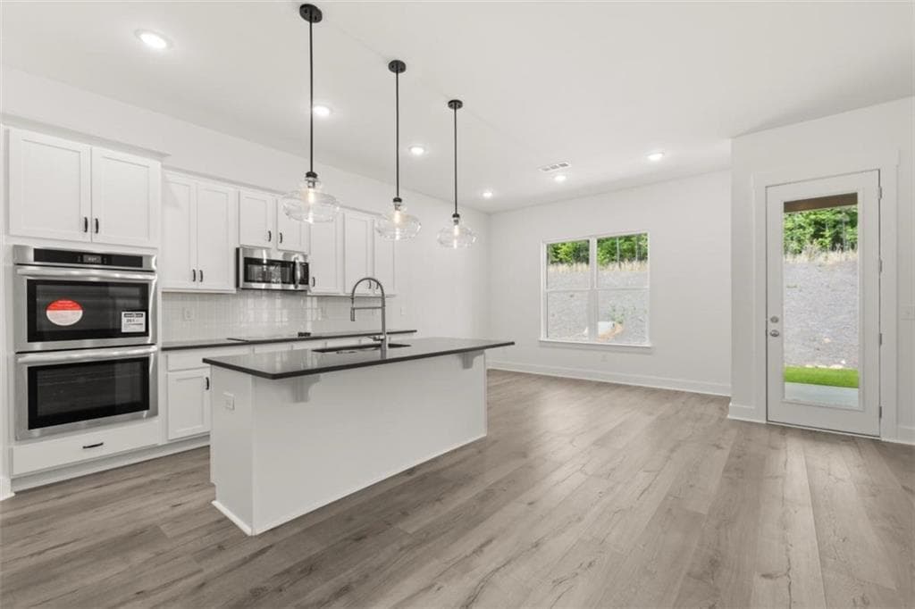 5 bedroom, 4 bathroom, 3,207 sq ft single family residence for sale at 3354 Traditions Way, Jefferson, GA 30549 — photo 5
