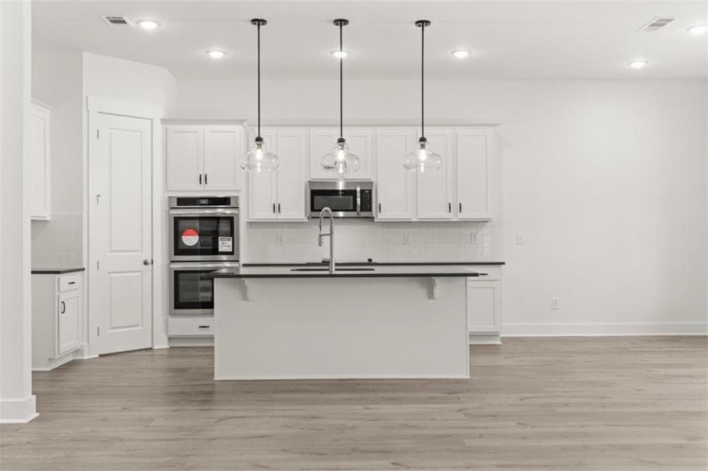 5 bedroom, 4 bathroom, 3,207 sq ft single family residence for sale at 3354 Traditions Way, Jefferson, GA 30549 — photo 6