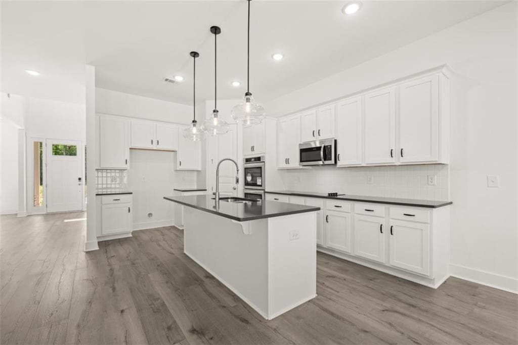 5 bedroom, 4 bathroom, 3,207 sq ft single family residence for sale at 3354 Traditions Way, Jefferson, GA 30549 — photo 7