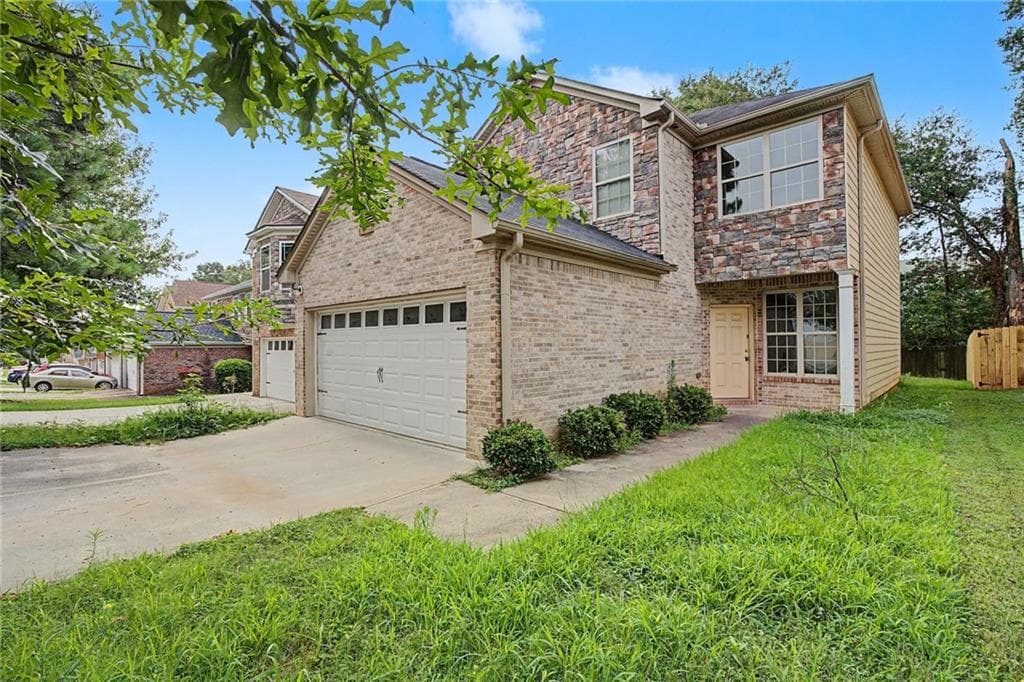 4 bedroom, 3 bathroom, 1,992 sq ft single family residence for sale at 1441 Arbor Place Drive, Morrow, GA 30260 — photo 2