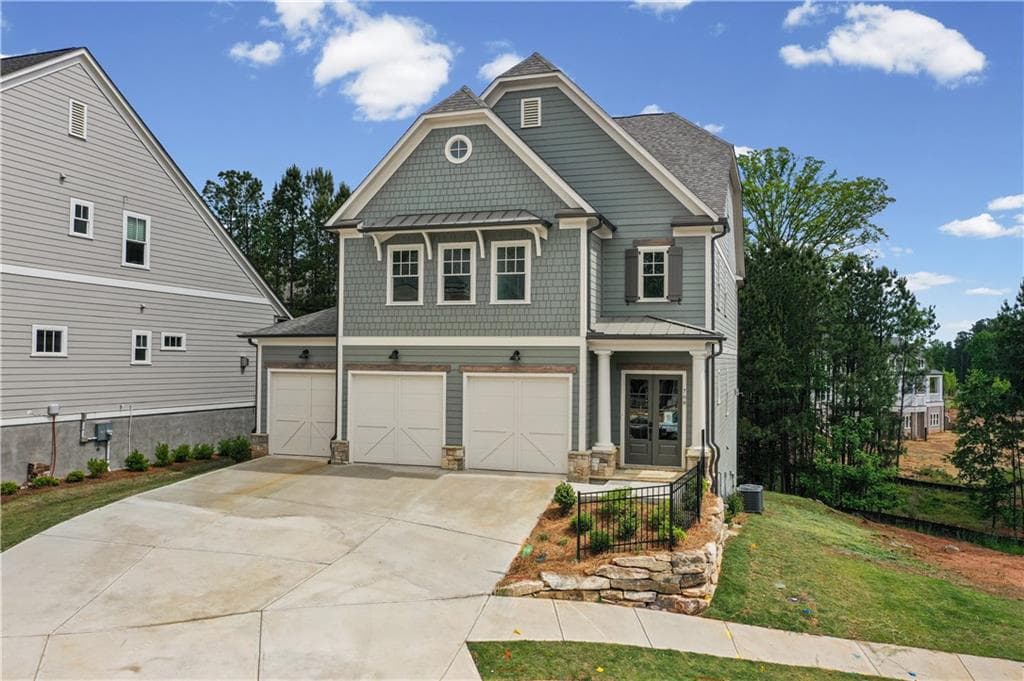 5 bedroom, 5 bathroom, 4,169 sq ft single family residence for sale at 708 Woodlake Court, Canton, GA 30114 — photo 2