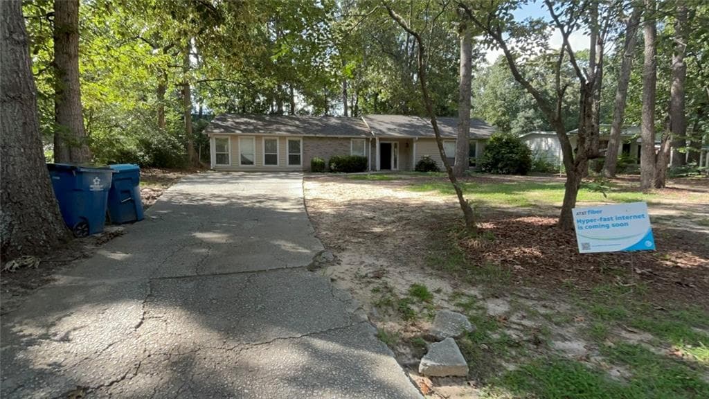 4 bedroom, 2 bathroom, 1,723 sq ft single family residence sold at 1163 Sandalwood Drive, Lawrenceville, GA 30043