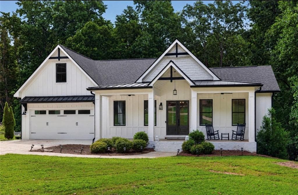 4 bedroom, 4 bathroom, 4,817 sq ft single family residence for sale at 6052 Oak Hill Drive, Flowery Branch, GA 30542 — photo 1 of 50