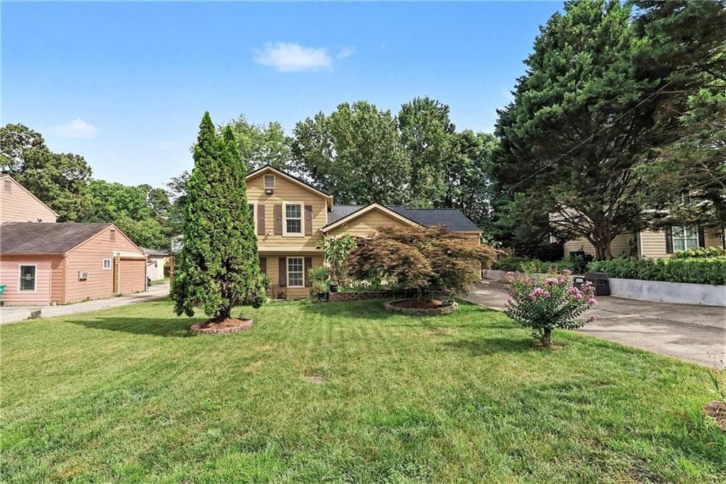 3 bedroom, 2 bathroom, 1,560 sq ft single family residence for sale at 1551 Shenta Oak Drive, Norcross, GA 30093 — photo 3