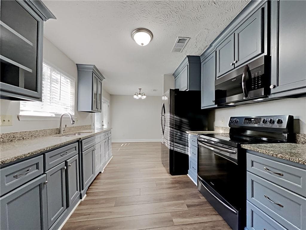 4 bedroom, 2 bathroom, 1,452 sq ft single family residence for rent at 968 Country Oaks Court, Lawrenceville, GA 30044 for $1,980 a month — photo 2