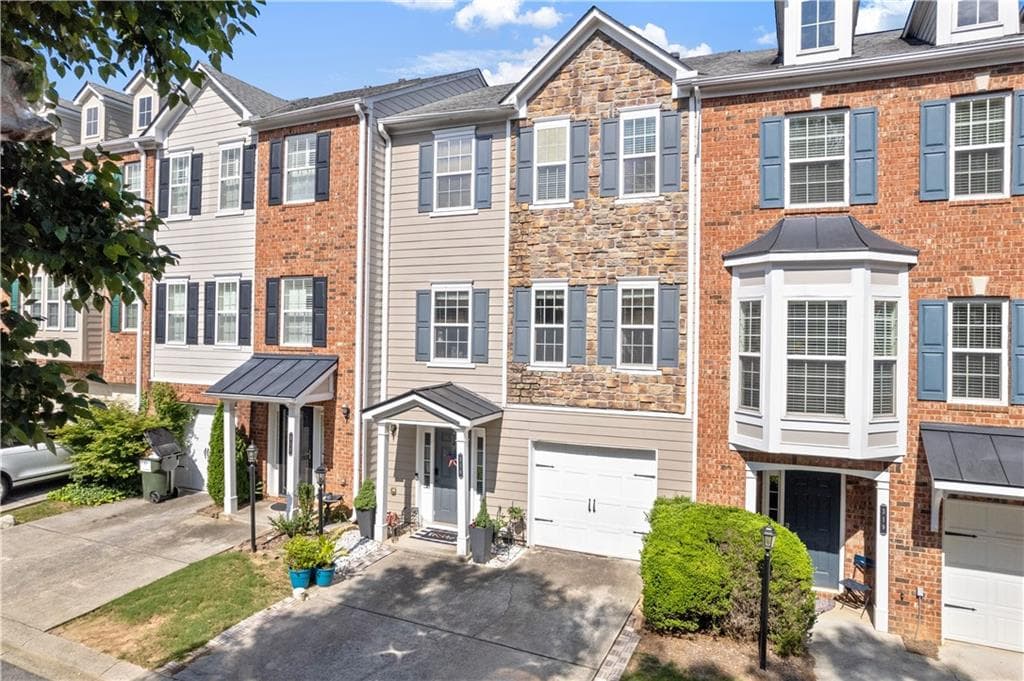 3 bedroom, 4 bathroom, 1,784 sq ft townhouse for sale at 2928 George Busbee Parkway 318, Kennesaw, GA 30144 — photo 1 of 31