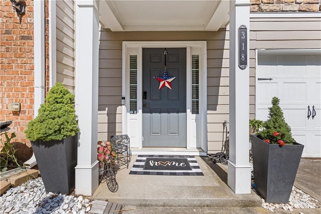 3 bedroom, 4 bathroom, 1,784 sq ft townhouse for sale at 2928 George Busbee Parkway 318, Kennesaw, GA 30144 — photo 2