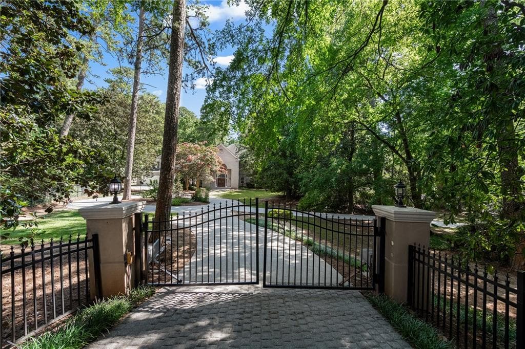 5 bedroom, 7 bathroom single family residence for rent at 680 W Paces Ferry Road, Atlanta, GA 30327 for $8,000 a month — photo 1 of 48