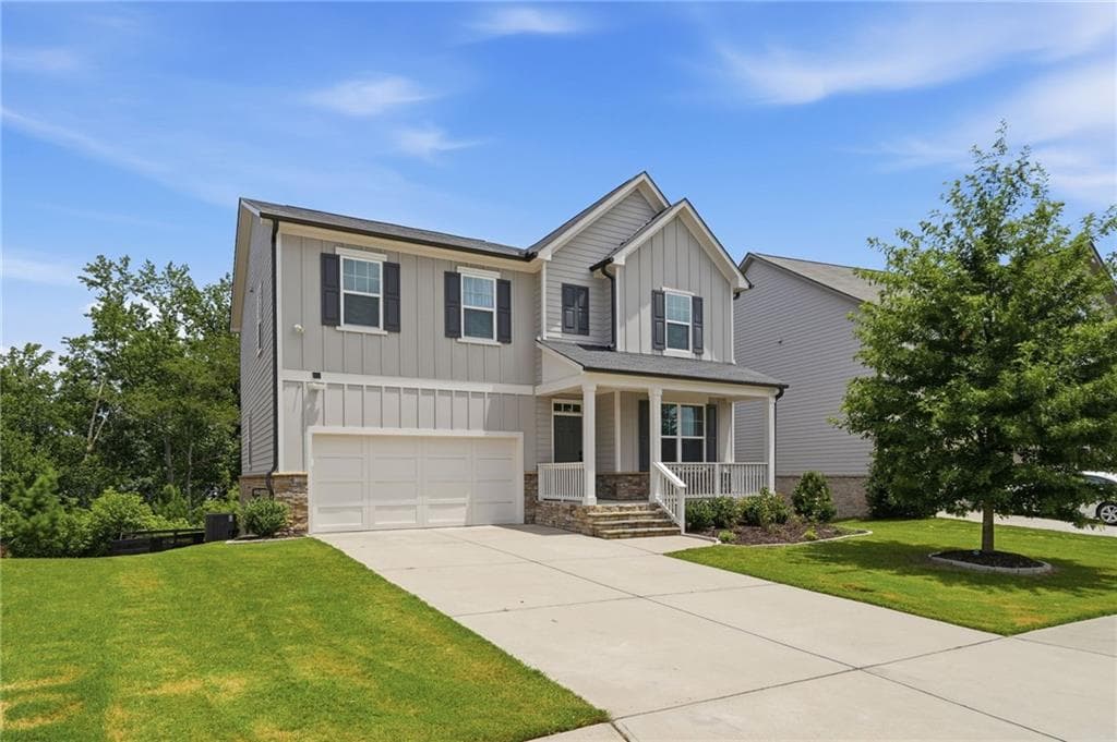 4 bedroom, 3 bathroom, 2,319 sq ft single family residence for sale at 5395 Coltman Drive, Cumming, GA 30028 — photo 2