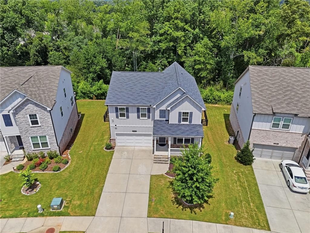 4 bedroom, 3 bathroom, 2,319 sq ft single family residence for sale at 5395 Coltman Drive, Cumming, GA 30028 — photo 5