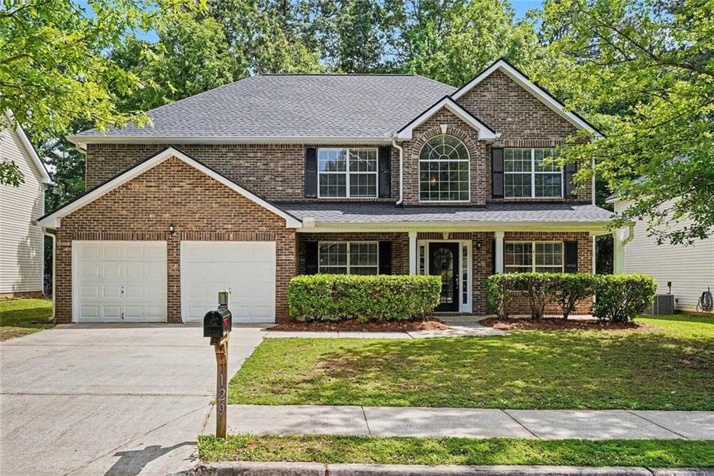 4 bedroom, 3 bathroom, 2,672 sq ft single family residence for sale at 129 Kentwood Springs Drive, Hampton, GA 30228 — photo 1 of 45