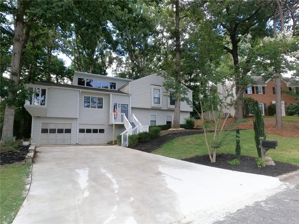 5 bedroom, 3 bathroom, 2,674 sq ft single family residence for sale at 510 Wood Valley Trc, Roswell, GA 30076