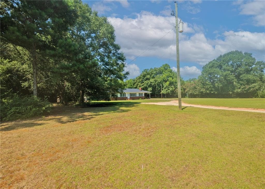 4 bedroom, 2 bathroom, 2,457 sq ft single family residence for sale at 1803 Bowman Highway, Dewy Rose, GA 30634 — photo 6