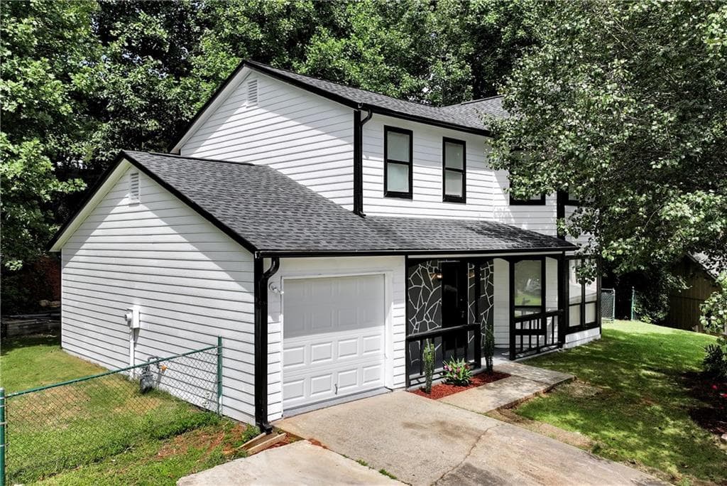 4 bedroom, 3 bathroom, 1,568 sq ft single family residence for sale at 556 Sunfield Drive, Lilburn, GA 30047 — photo 2