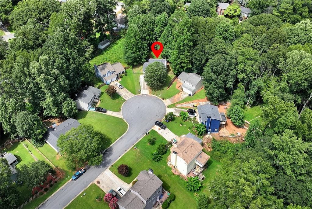 4 bedroom, 3 bathroom, 1,568 sq ft single family residence for sale at 556 Sunfield Drive, Lilburn, GA 30047 — photo 3