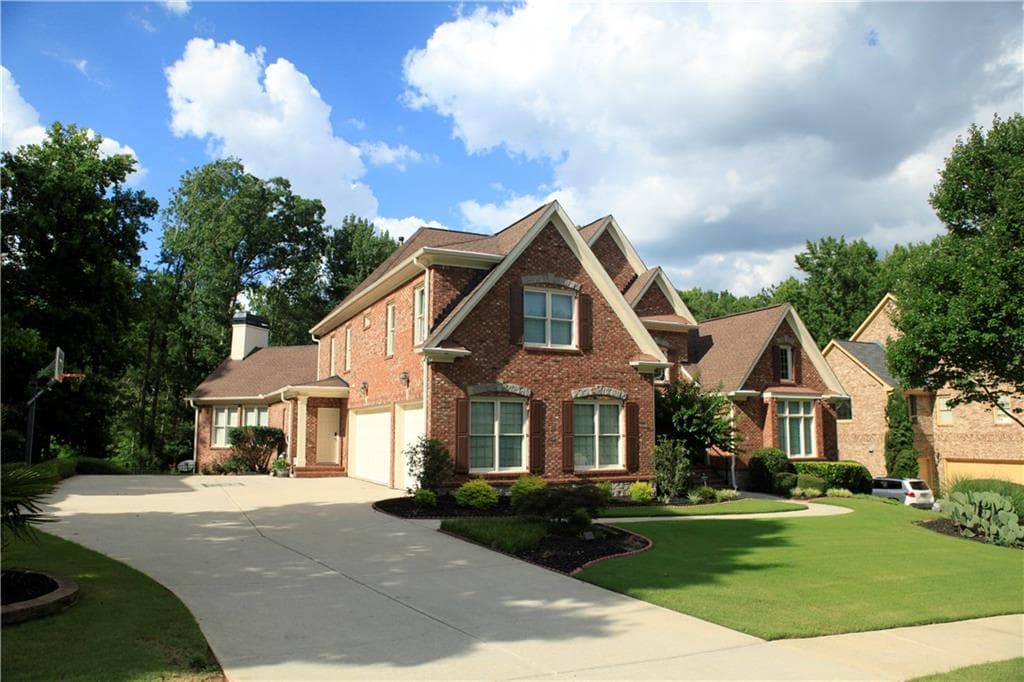 6 bedroom, 7 bathroom, 7,803 sq ft single family residence for sale at 2201 Hunters Green Drive, Lawrenceville, GA 30043 — photo 2