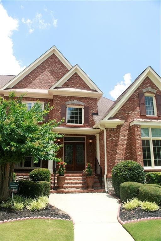 6 bedroom, 7 bathroom, 7,803 sq ft single family residence for sale at 2201 Hunters Green Drive, Lawrenceville, GA 30043 — photo 4