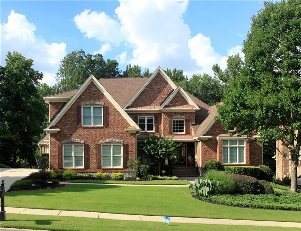 6 bedroom, 7 bathroom, 7,803 sq ft single family residence for sale at 2201 Hunters Green Drive, Lawrenceville, GA 30043
