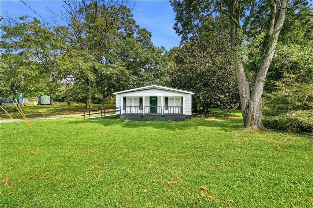 3 bedroom, 1 bathroom, 1,271 sq ft single family residence for sale at 2972 Jefferson Street, Austell, GA 30106 — photo 2