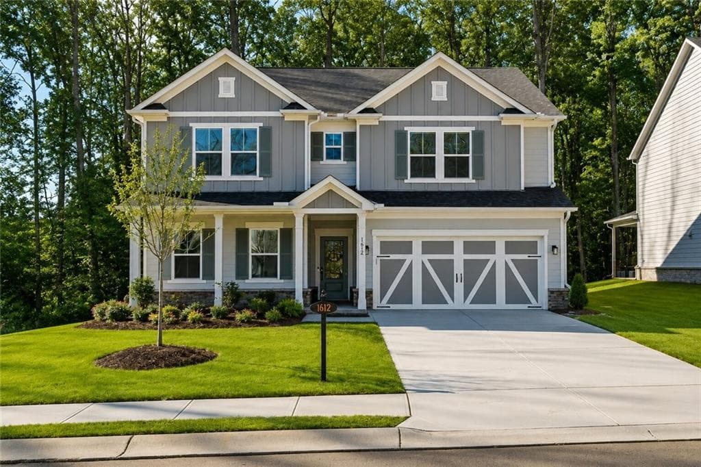 5 bedroom, 3 bathroom, 3,058 sq ft single family residence for sale at 1612 Tide Mill Road, Cumming, GA 30040 — photo 1 of 25