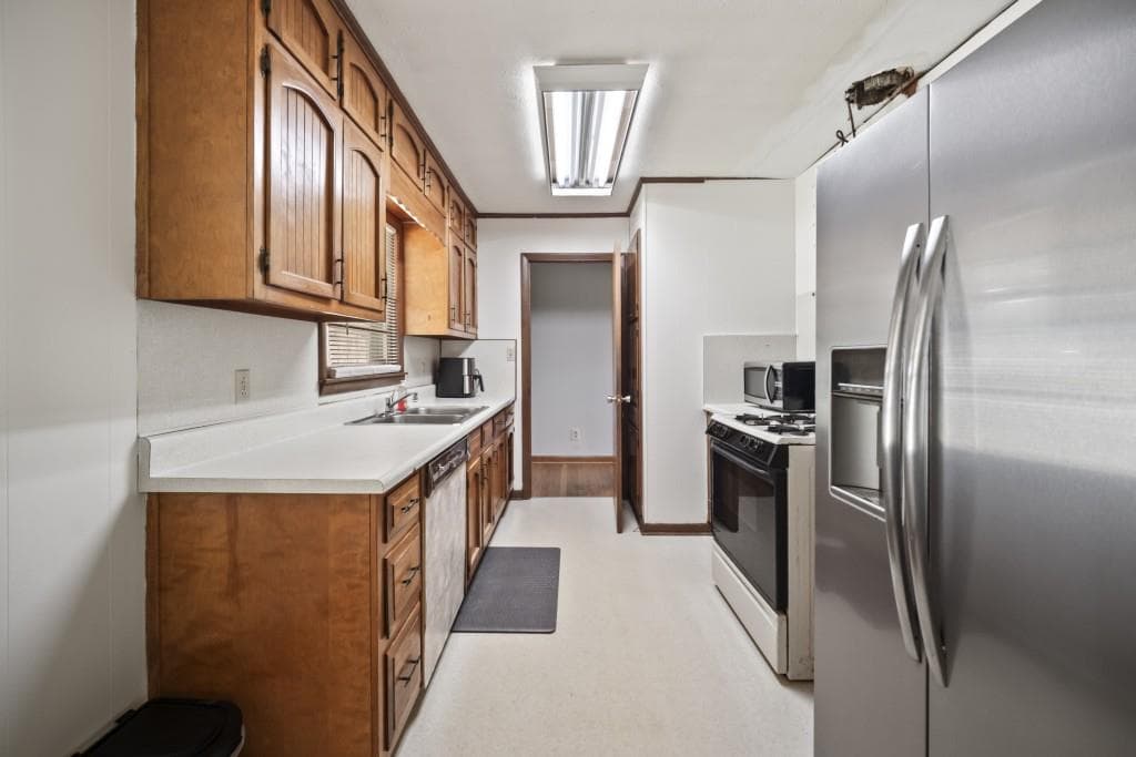 3 bedroom, 2 bathroom, 1,468 sq ft single family residence for sale at 1810 Hasty Road, Marietta, GA 30062 — photo 3