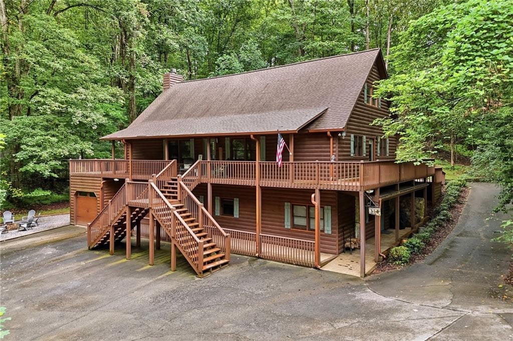 4 bedroom, 4 bathroom, 3,360 sq ft single family residence for sale at 314 Northcutt Road, Ellijay, GA 30540 — photo 1 of 70