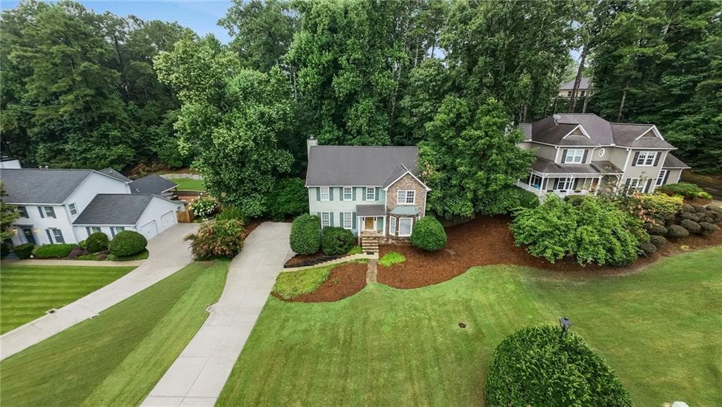 4 bedroom, 4 bathroom, 2,484 sq ft single family residence for sale at 3385 New Heritage Drive, Johns Creek, GA 30022 — photo 4