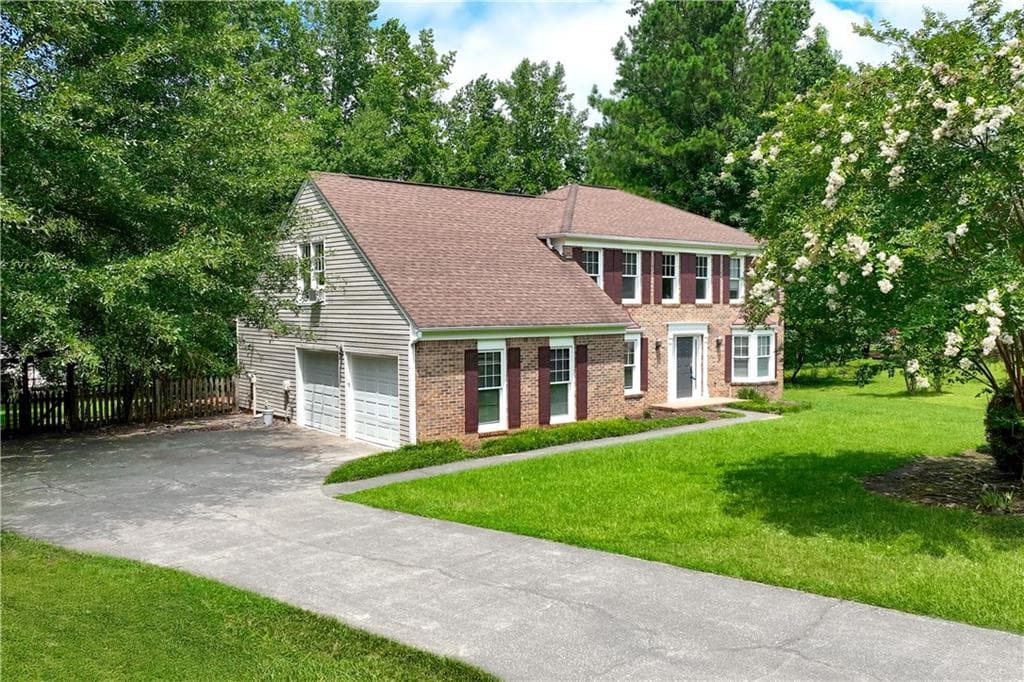 4 bedroom, 3 bathroom, 2,499 sq ft single family residence for sale at 4288 Millhouse Lane, Peachtree Corners, GA 30092 — photo 2