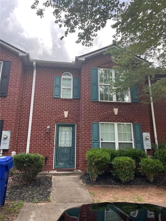 3 bedroom, 3 bathroom, 1,520 sq ft townhouse for sale at 2434 Piering Drive, Lithonia, GA 30038 — photo 1 of 25