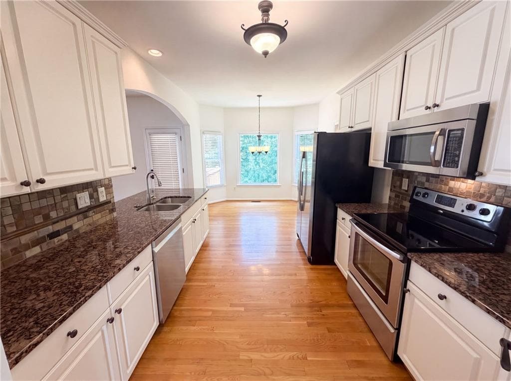 4 bedroom, 3 bathroom, 3,164 sq ft single family residence for sale at 3612 Brookefall Court, Suwanee, GA 30024 — photo 2