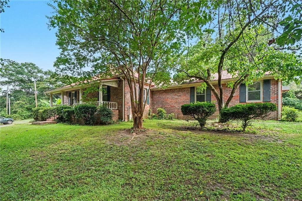 3 bedroom, 2 bathroom, 1,946 sq ft single family residence for sale at 2021 W Hightower Trail, Conyers, GA 30012 — photo 2