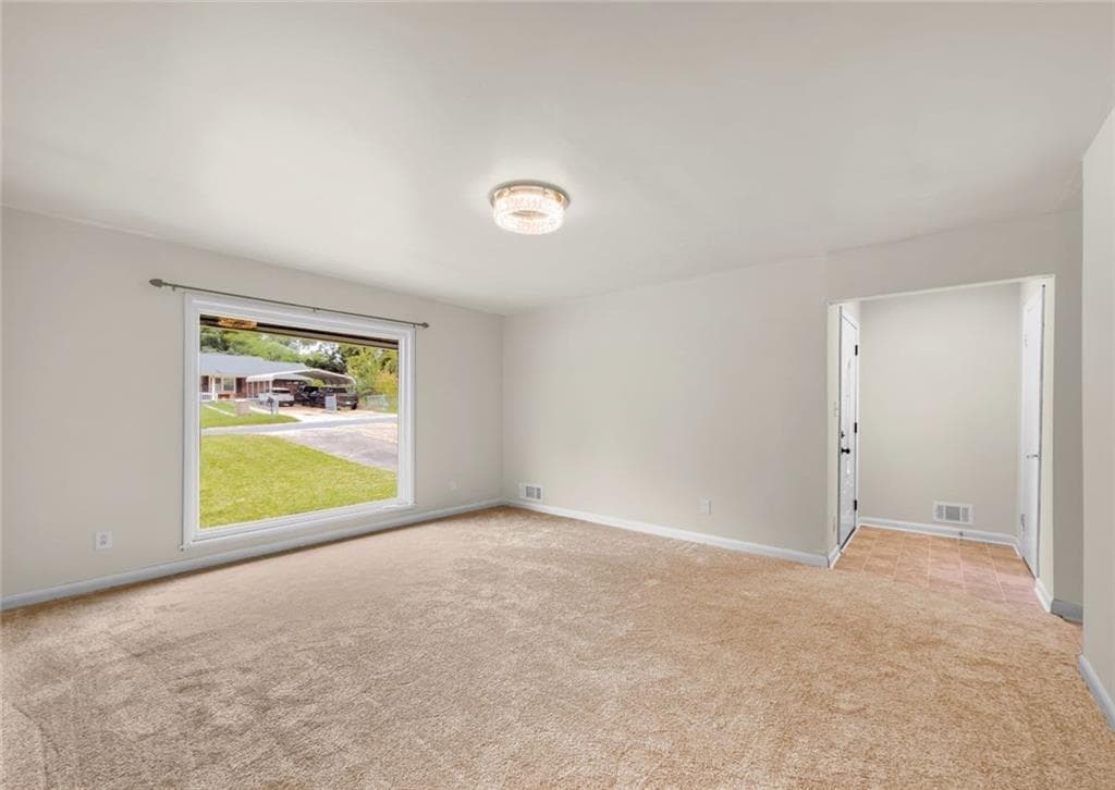 3 bedroom, 2 bathroom, 1,310 sq ft single family residence for sale at 565 Wavelyn Way, Riverdale, GA 30274 — photo 3
